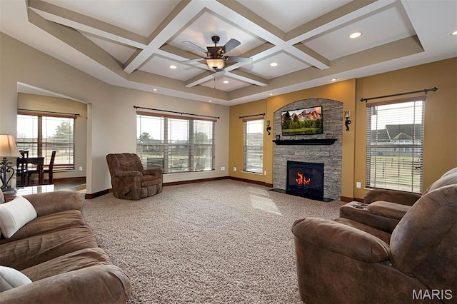 9606 Klings Ct, Mascoutah, IL 62258 - carpeted living area featuring baseboards, coffered ceiling, plenty of natural light, ceiling fan, and a fireplace