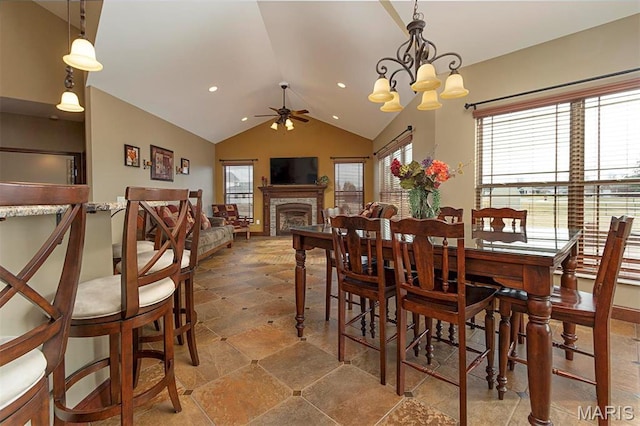 9606 Klings Ct, Mascoutah, IL 62258 - dining area featuring a ceiling fan, plenty of natural light, lofted ceiling, a fireplace, and recessed lighting