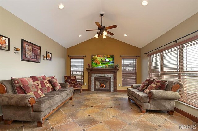 9606 Klings Ct, Mascoutah, IL 62258 - living area with a ceiling fan, baseboards, vaulted ceiling, recessed lighting, and a lit fireplace