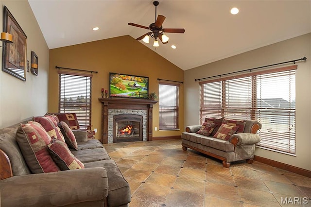 9606 Klings Ct, Mascoutah, IL 62258 - living area with vaulted ceiling, baseboards, a ceiling fan, recessed lighting, and a stone fireplace