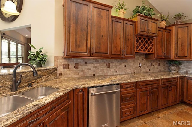 9606 Klings Ct, Mascoutah, IL 62258 - kitchen featuring a sink, backsplash, light stone counters, lofted ceiling, and stainless steel dishwasher
