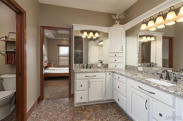 9606 Klings Ct, Mascoutah, IL 62258 - bathroom featuring toilet, double vanity, a chandelier, and tiled shower