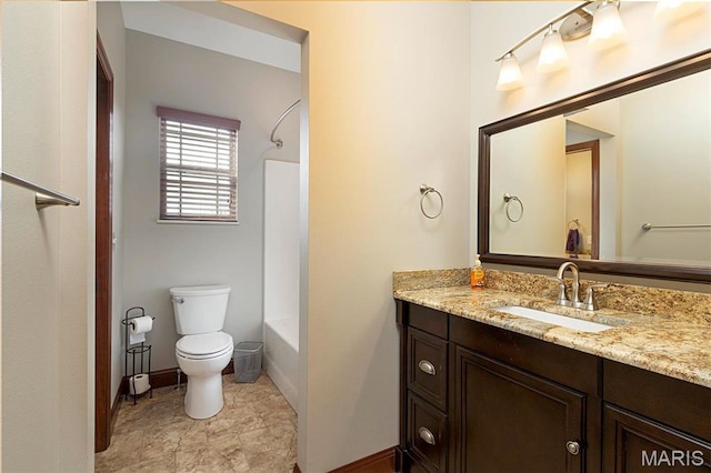 9606 Klings Ct, Mascoutah, IL 62258 - full bath with baseboards, toilet, vanity, and shower / washtub combination