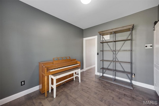 1218 Cold Spring Dr, Ofallon, MO 63368 - sitting room with baseboards and dark wood-style flooring
