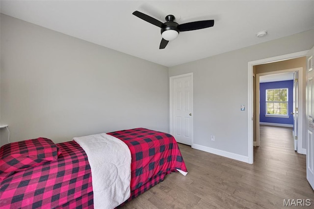1218 Cold Spring Dr, Ofallon, MO 63368 - bedroom featuring wood finished floors, baseboards, and a ceiling fan