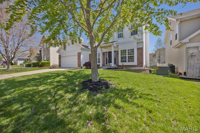 1218 Cold Spring Dr, Ofallon, MO 63368 - traditional-style house featuring brick siding, driveway, a front lawn, and a garage