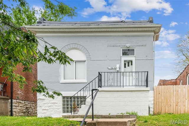 4649 Louisiana Ave, Saint Louis, MO 63111 - rear view of property with brick siding and fence