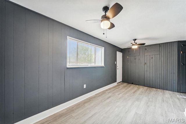 4649 Louisiana Ave, Saint Louis, MO 63111 - empty room with ceiling fan, light wood-style floors, and baseboards