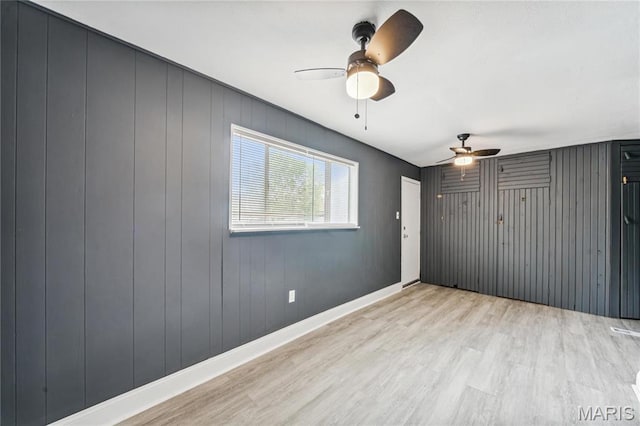 4649 Louisiana Ave, Saint Louis, MO 63111 - spare room featuring ceiling fan, light wood-type flooring, and baseboards