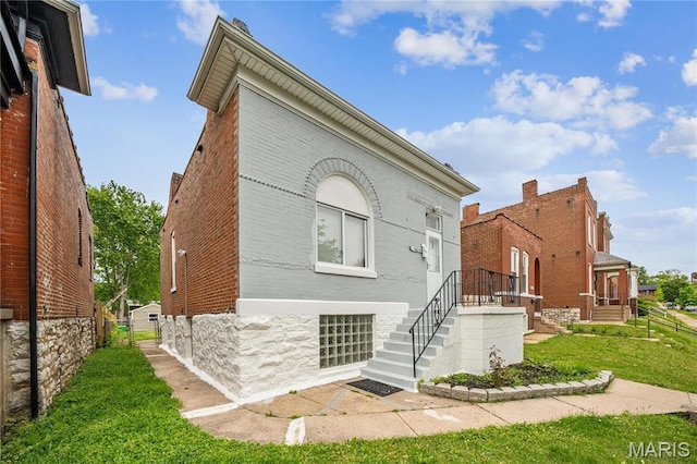 4649 Louisiana Ave, Saint Louis, MO 63111 - back of house featuring brick siding
