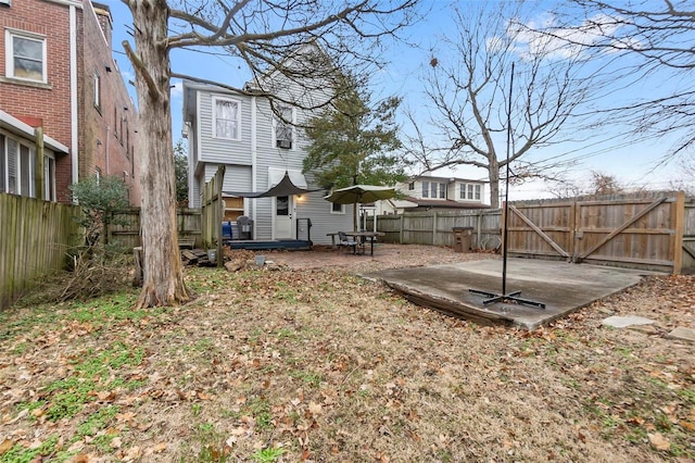 34 N Fountain Cpe, Girardeau, MO 63701 - fenced backyard featuring a patio and a gate