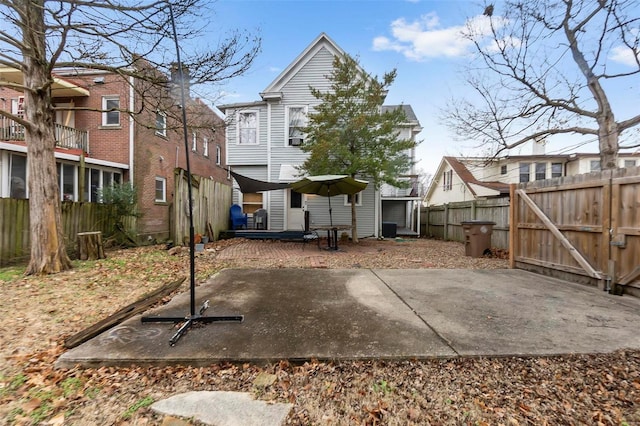 34 N Fountain Cpe, Girardeau, MO 63701 - rear view of house with fence and a patio area
