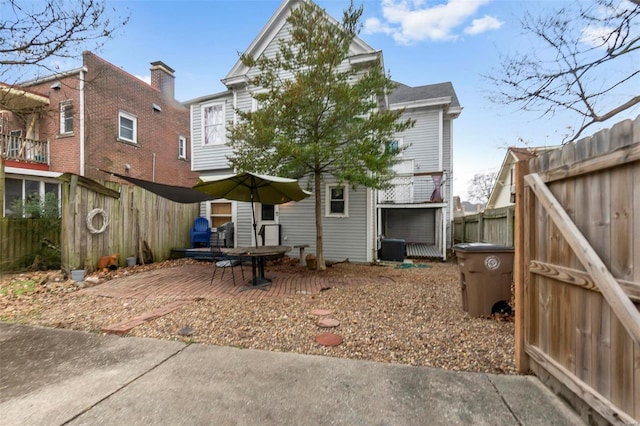 34 N Fountain Cpe, Girardeau, MO 63701 - back of property with fence, a patio, and cooling unit