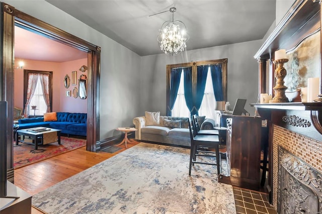 34 N Fountain Cpe, Girardeau, MO 63701 - living area featuring wood finished floors and a chandelier