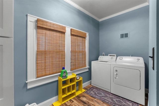 34 N Fountain Cpe, Girardeau, MO 63701 - clothes washing area with separate washer and dryer, ornamental molding, wood finished floors, and baseboards