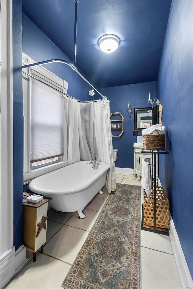 34 N Fountain Cpe, Girardeau, MO 63701 - full bath featuring tile patterned flooring, a freestanding bath, curtained shower, and baseboard heating