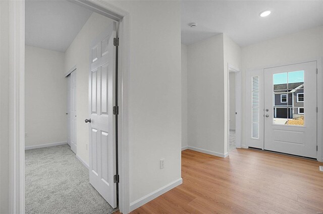 49 Back Ln Unit 49Stb, Washington, MO 63090 - foyer with baseboards, light wood-type flooring, and recessed lighting