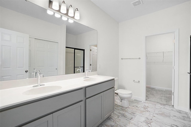 49 Back Ln Unit 49Stb, Washington, MO 63090 - bathroom with marble look tiles, a stall shower, double vanity, toilet, and baseboards