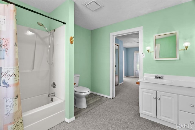 full bath featuring toilet, baseboards, vanity, and shower / bathtub combination with curtain