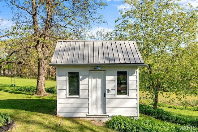 view of outbuilding with an outdoor structure