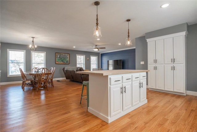 601 Broadway St, Van Buren, MO 63965 - kitchen with open floor plan, baseboards, decorative light fixtures, ceiling fan, and recessed lighting