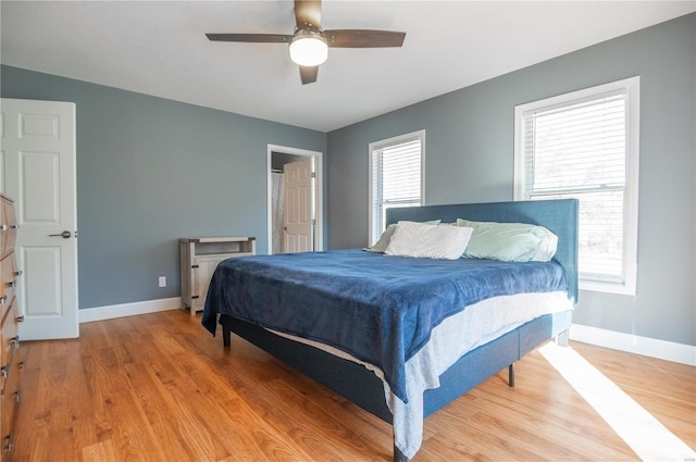601 Broadway St, Van Buren, MO 63965 - bedroom featuring baseboards, light wood-style floors, and a ceiling fan