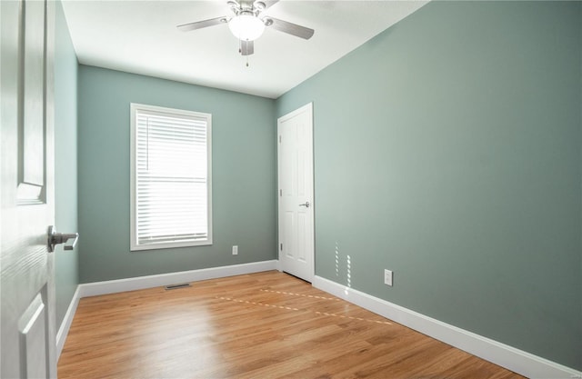 601 Broadway St, Van Buren, MO 63965 - empty room with baseboards, a ceiling fan, and light wood-style flooring