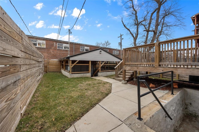 5818 Westminster Pl, Saint Louis, MO 63112 - view of yard featuring a wooden deck
