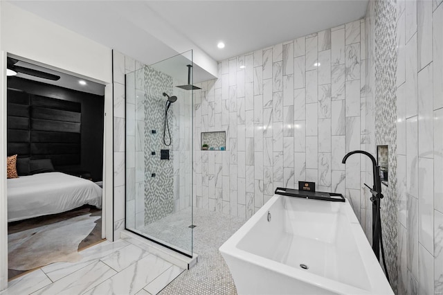 5818 Westminster Pl, Saint Louis, MO 63112 - full bath with a sink, marble look tile flooring, a walk in shower, a freestanding tub, and recessed lighting