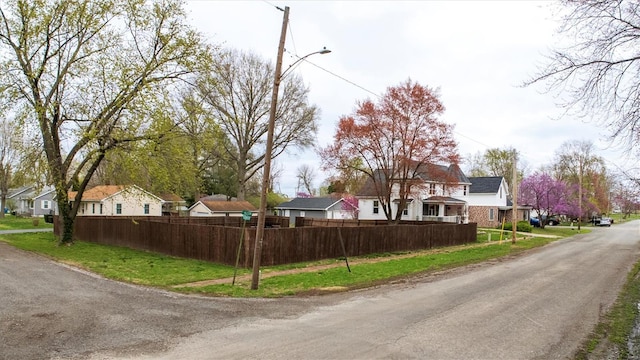 211 E Alton St, Marine, IL 62061 - view of asphalt road with a residential view and street lights