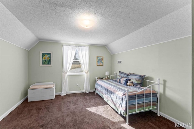1451 Bella Vista Dr, Jackson, MO 63755 - carpeted bedroom featuring lofted ceiling, a textured ceiling, and baseboards