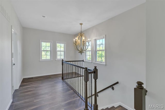 3560 Saint Albans Rd, Saint Albans, MO 63073 - stairs with a chandelier, wood finished floors, and baseboards