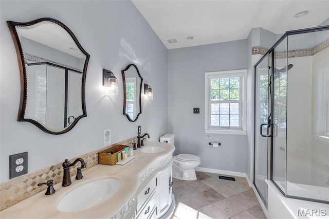 3560 Saint Albans Rd, Saint Albans, MO 63073 - bathroom featuring toilet, double vanity, and baseboards