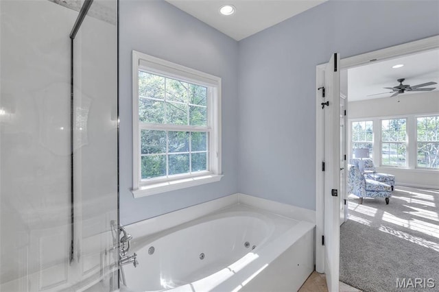 3560 Saint Albans Rd, Saint Albans, MO 63073 - full bathroom with plenty of natural light, ensuite bath, a jetted tub, a ceiling fan, and recessed lighting