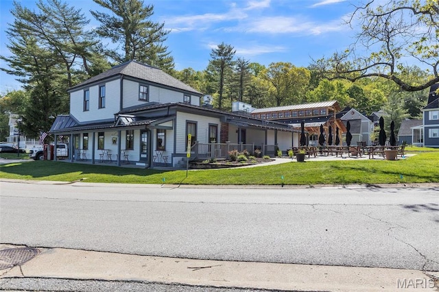 3560 Saint Albans Rd, Saint Albans, MO 63073 - view of front of property with an attached garage and a front lawn