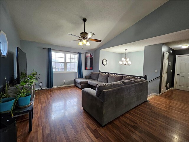 19782 Sugar Ln, Waynesville, MO 65583 - living area featuring dark wood-style floors, ceiling fan, a chandelier, a textured ceiling, and vaulted ceiling
