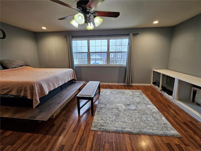 19782 Sugar Ln, Waynesville, MO 65583 - bedroom featuring a textured ceiling, recessed lighting, wood finished floors, baseboards, and a ceiling fan