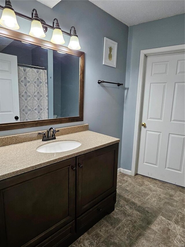 19782 Sugar Ln, Waynesville, MO 65583 - full bathroom with vanity and baseboards