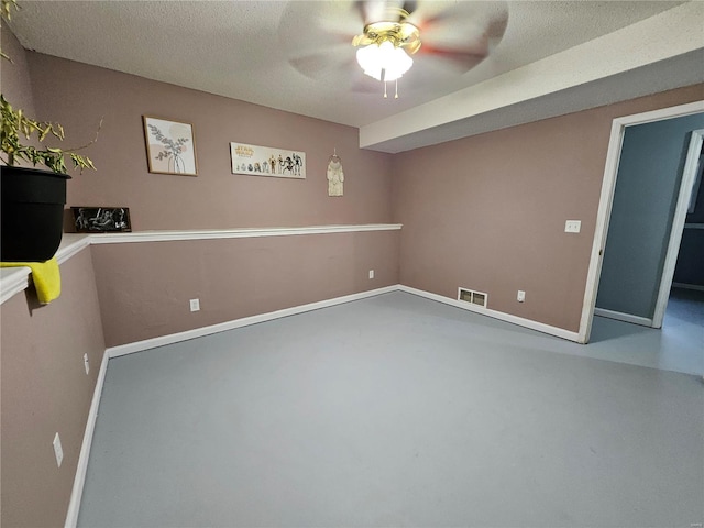 19782 Sugar Ln, Waynesville, MO 65583 - below grade area featuring a ceiling fan and baseboards