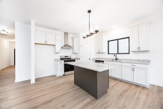 905 Montebello Ln, Ofallon, IL 62269 - kitchen with appliances with stainless steel finishes, wall chimney exhaust hood, a sink, white cabinetry, and a center island
