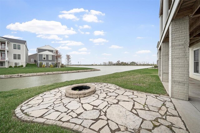 4036 Hempstead St, Saint Charles, MO 63301 - view of green lawn with a water view, an outdoor fire pit, and a patio area