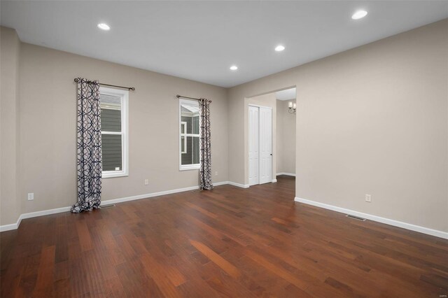 4036 Hempstead St, Saint Charles, MO 63301 - spare room with wood finished floors, baseboards, a chandelier, and recessed lighting