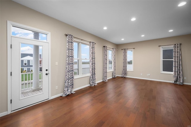 4036 Hempstead St, Saint Charles, MO 63301 - unfurnished room with wood finished floors, baseboards, and recessed lighting