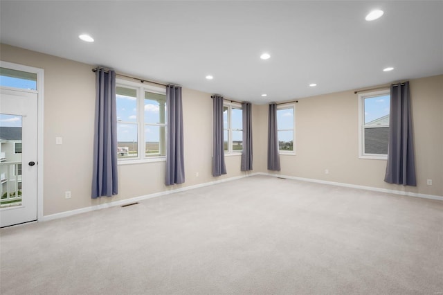 4036 Hempstead St, Saint Charles, MO 63301 - empty room with light colored carpet, recessed lighting, and baseboards
