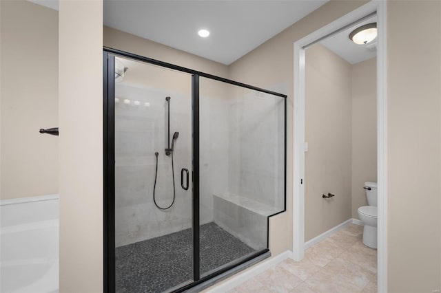 4036 Hempstead St, Saint Charles, MO 63301 - full bathroom with a shower stall, toilet, a bath, baseboards, and tile patterned floors