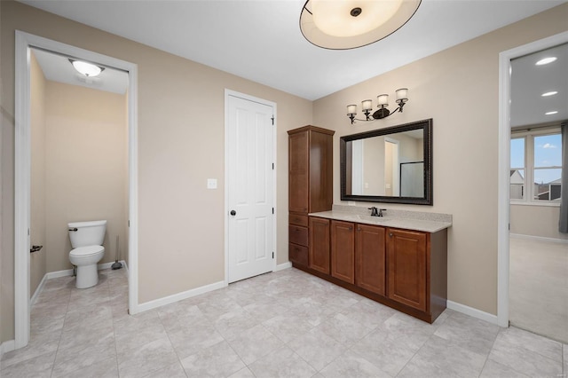 4036 Hempstead St, Saint Charles, MO 63301 - full bathroom with vanity, baseboards, toilet, and tile patterned flooring