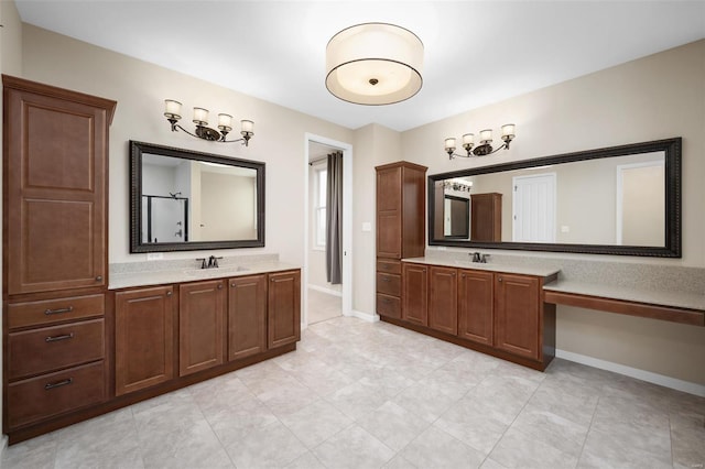 4036 Hempstead St, Saint Charles, MO 63301 - full bath with two vanities, baseboards, tile patterned floors, and a shower