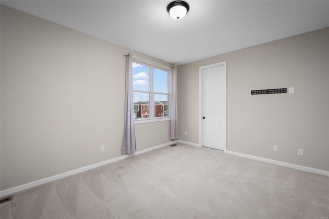 4036 Hempstead St, Saint Charles, MO 63301 - spare room with light colored carpet and baseboards
