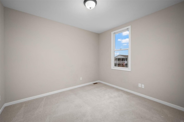 4036 Hempstead St, Saint Charles, MO 63301 - unfurnished room with light colored carpet and baseboards