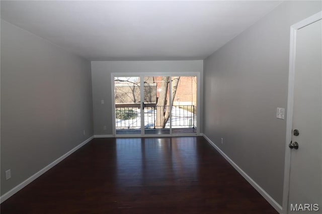 1090 Mersey Bend Dr Unit F, Saint Louis, MO 63129 - empty room with dark wood-style flooring and baseboards